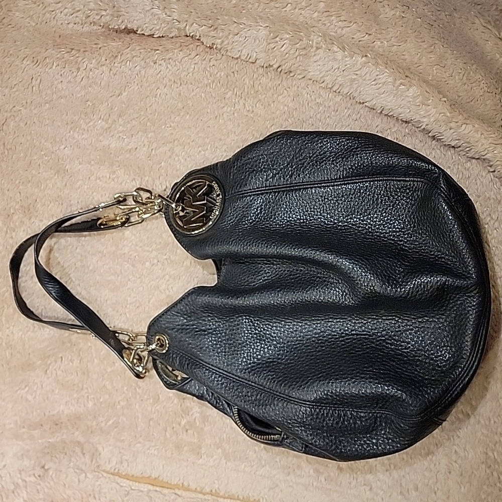 Gently used Michael Kors shoulder bag.